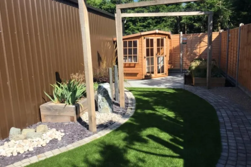 Garden path with paving and lawn