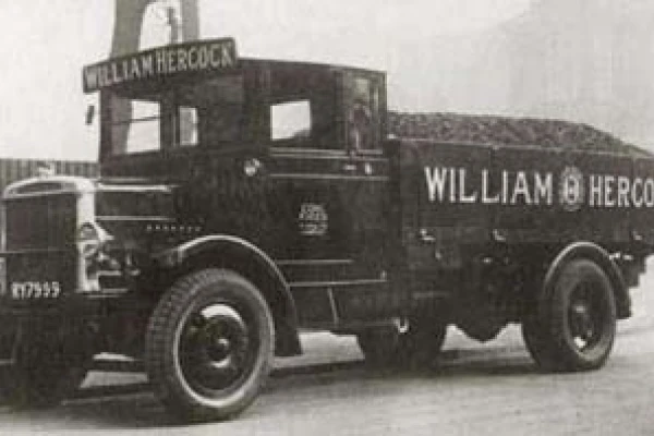 Historical image of 1930s transport branding, with the William Hercock branded logo
